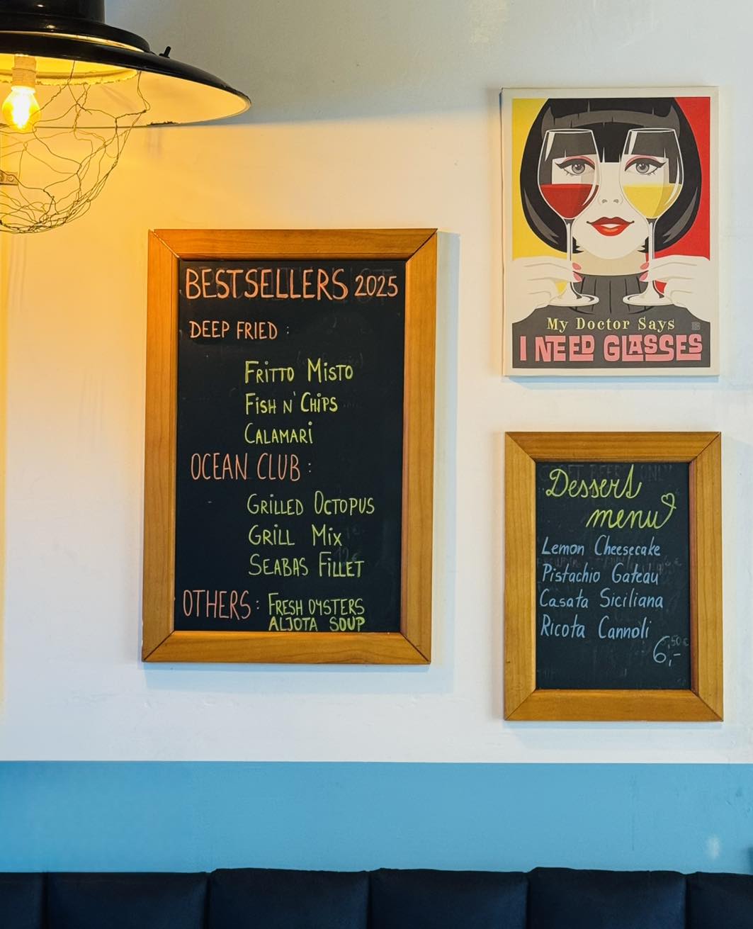 Bestsellers and dessert chalkboard menus at Forty Fishes
